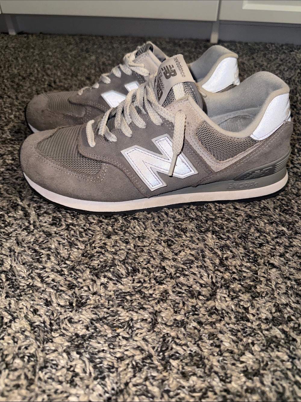 New Balance gray and white suede-mesh sneakers